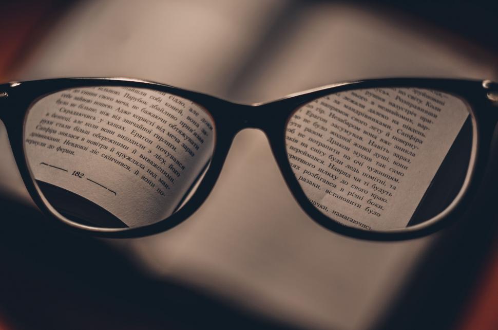Free Image of Glasses on Book 