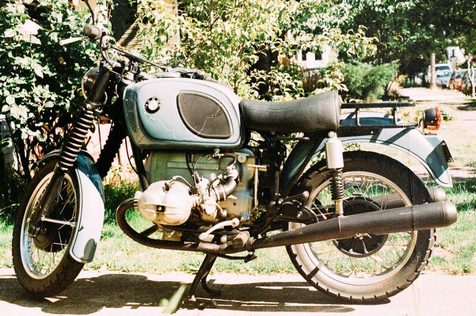 Free Image of Motorcycle Parked on Side of Road 