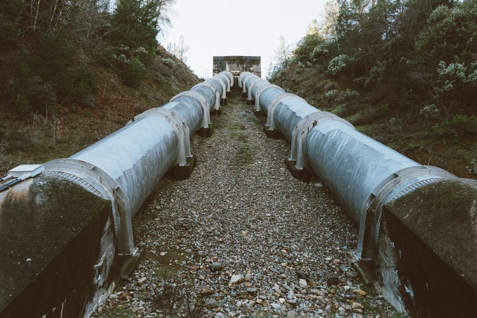 Free Image of Train Cars Parked on Gravel Road 