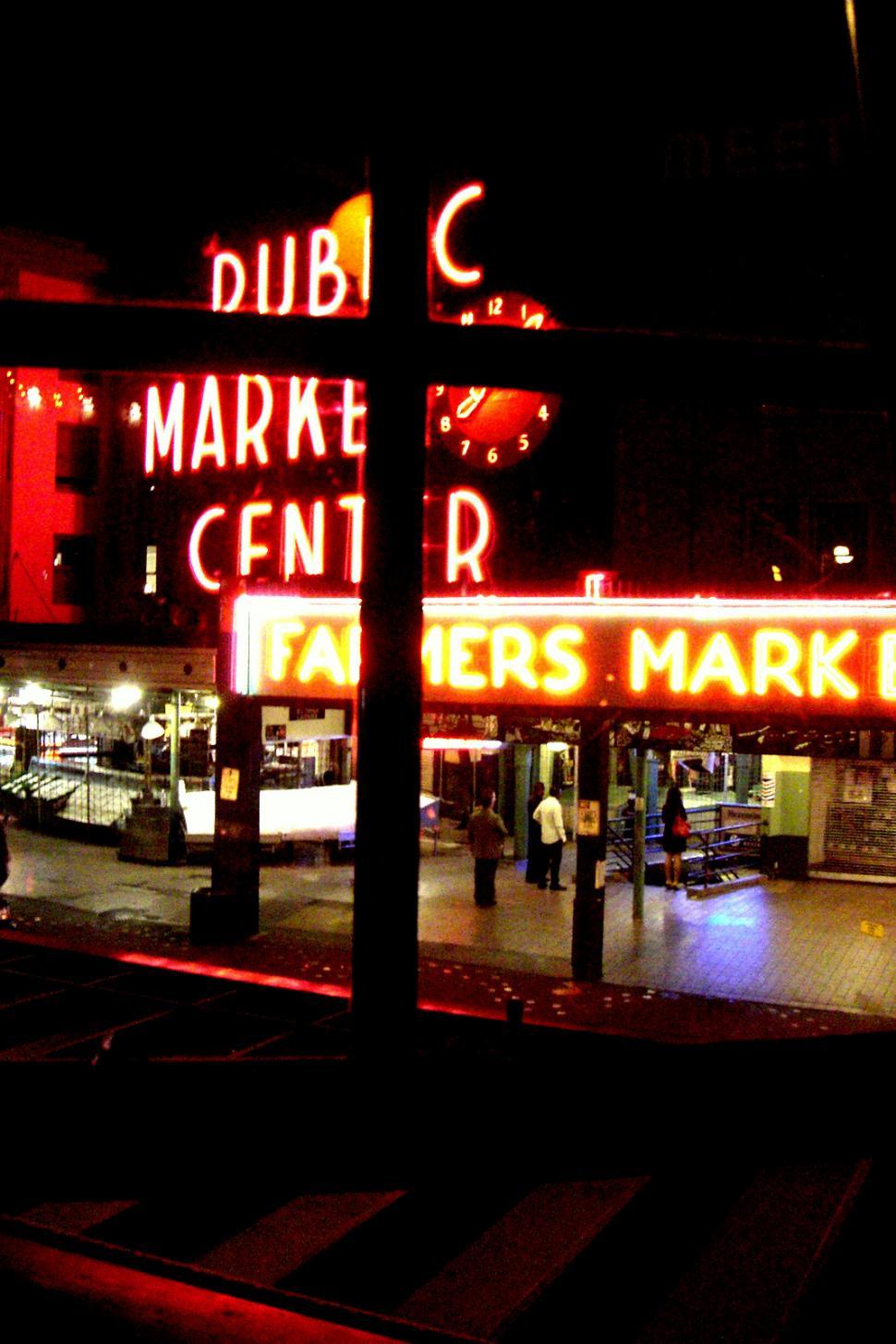Free Image of Bustling City Street With Neon Signs at Night 