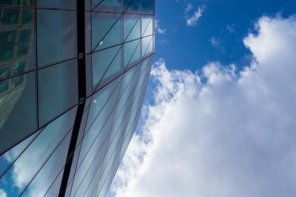 Free Image of Towering Skyscraper Against Blue Sky 