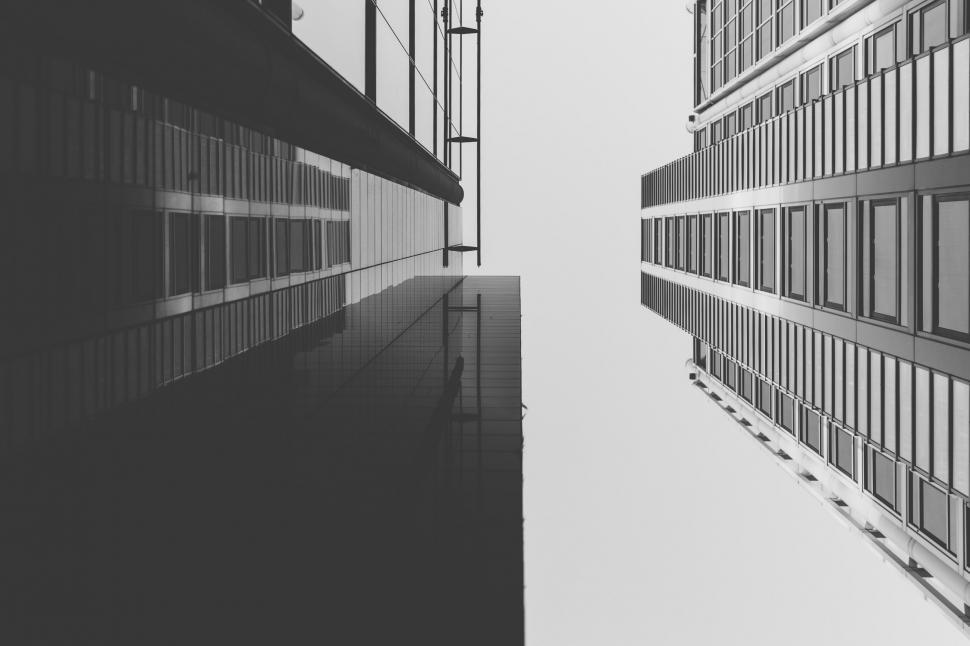 Free Image of Two Tall Buildings in Black and White 