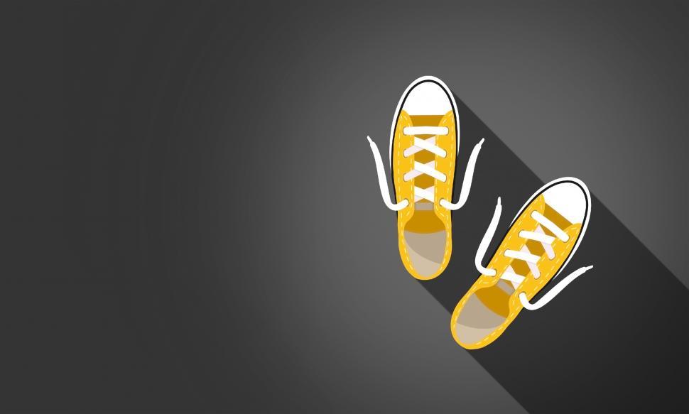 Yellow Sneakers on Dark Background - With Copyspace