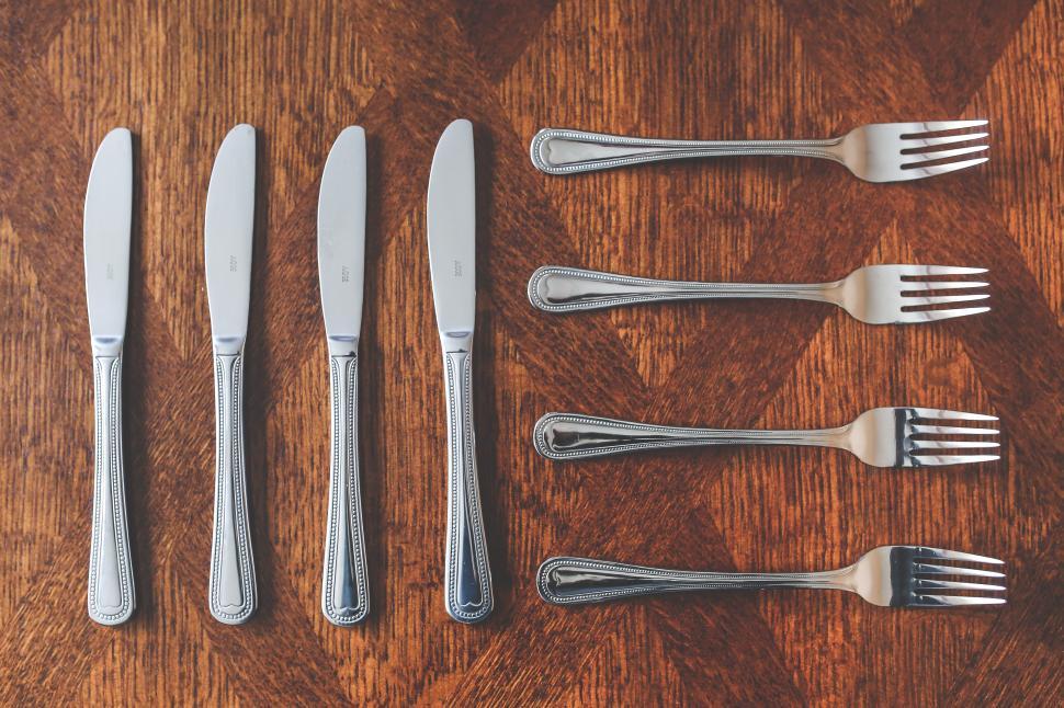 Free Image of Wooden Table With Silverware Arrangement 