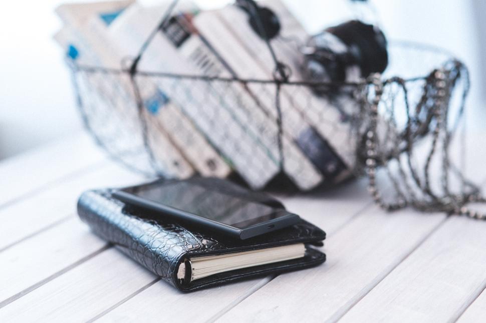 Free Image of Two Black Wallets on White Table 