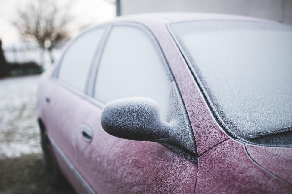 Free Image of Pink Car Parked on Side of Road 