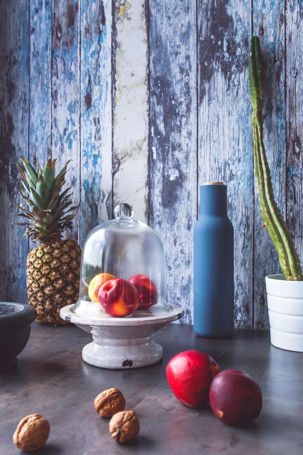 Free Image of Glass Dome Covered Table With Fruit 