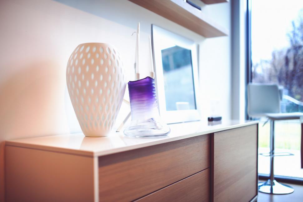 Free Image of White Vase on Wooden Dresser 