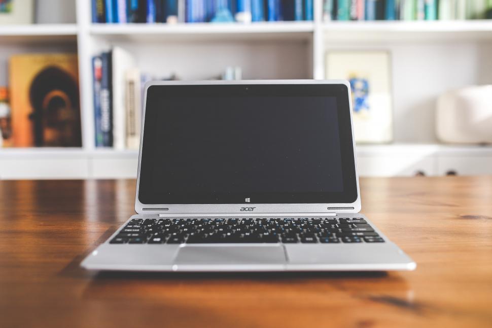 Free Image of Laptop Computer on Wooden Table 