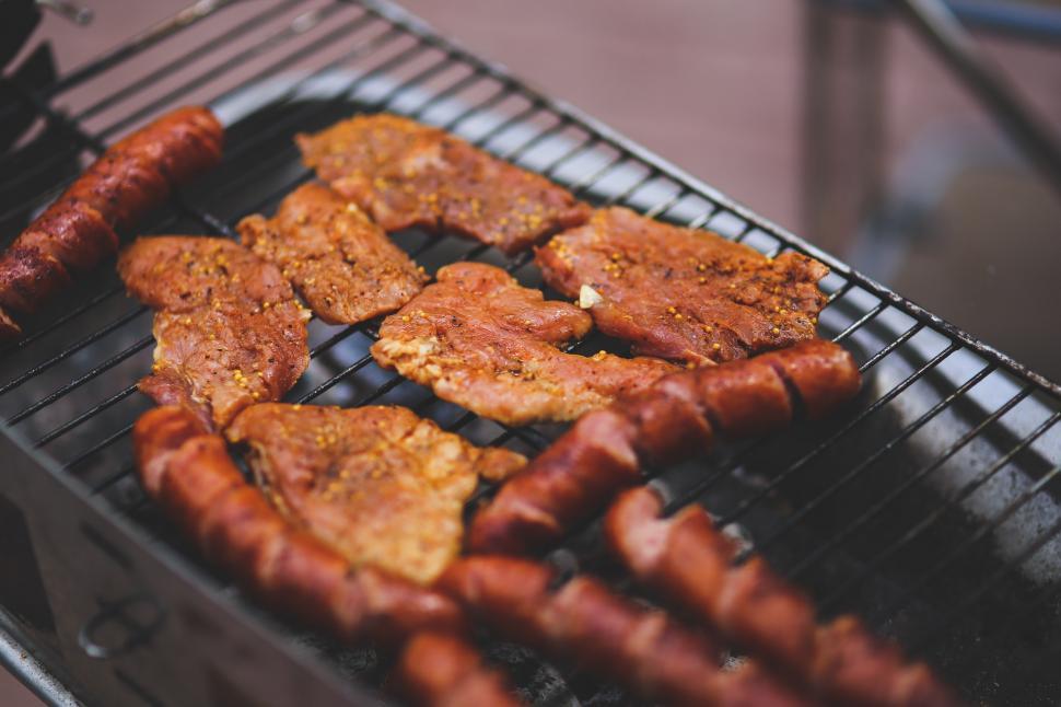 Free Image of Hot Dogs Cooking on a Grill 