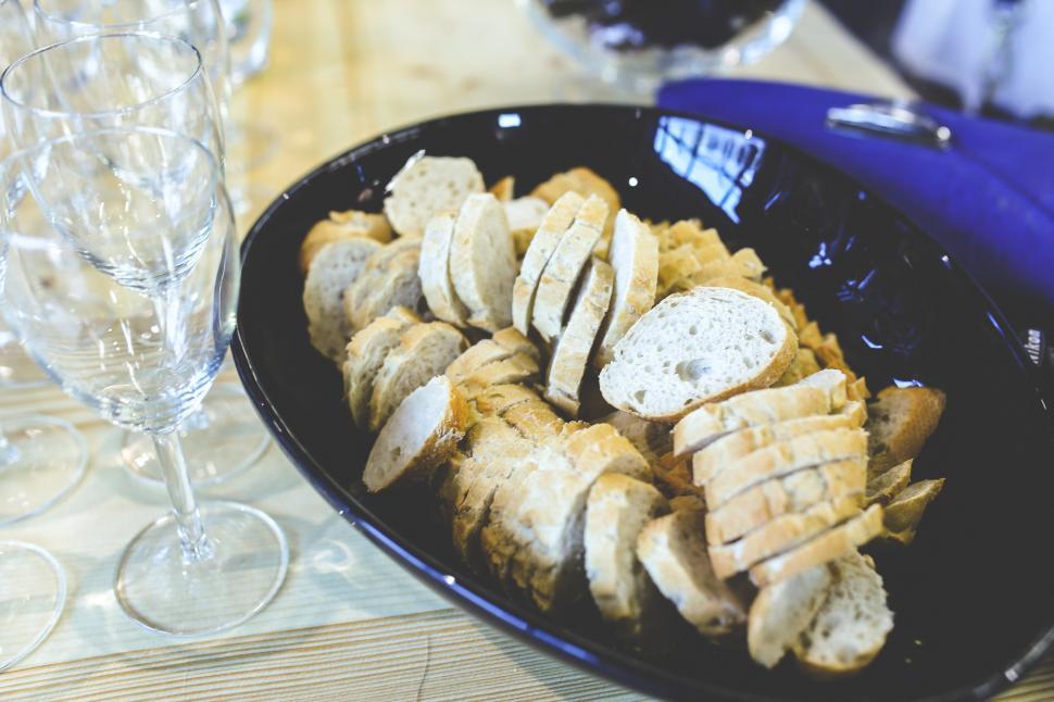 Free Image of Plate of Sliced Bread on Table 