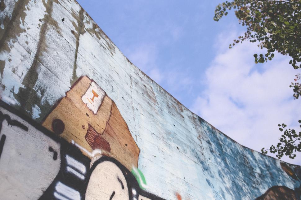 Free Image of Wall With a Clock Painting 