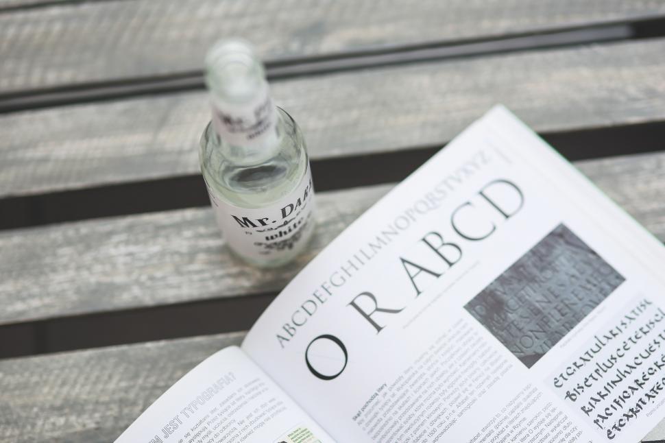 Free Image of Bottle of Water on Wooden Table 