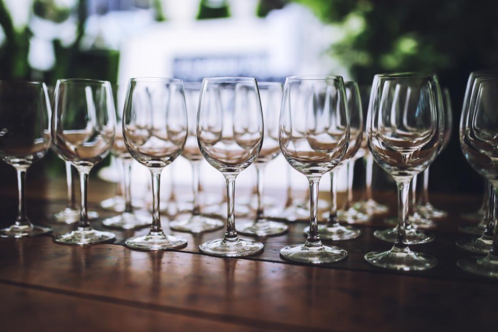 Free Image of Row of Wine Glasses on Wooden Table 