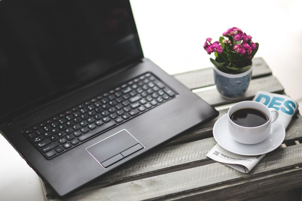 Free Image of Laptop Computer on Wooden Table 