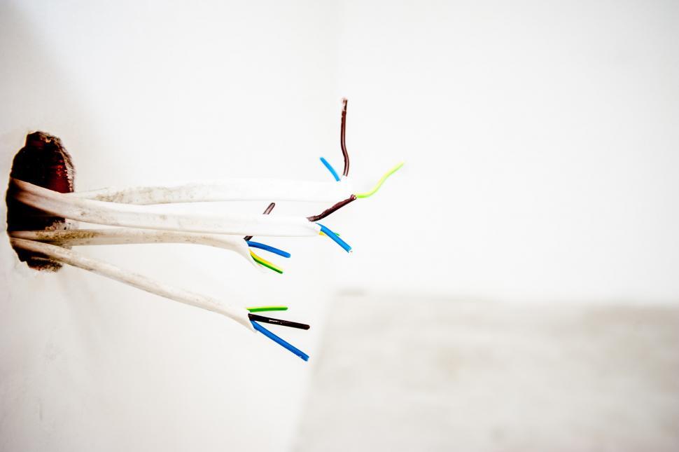 Free Image of Toothbrush Sticking Out of Wall 