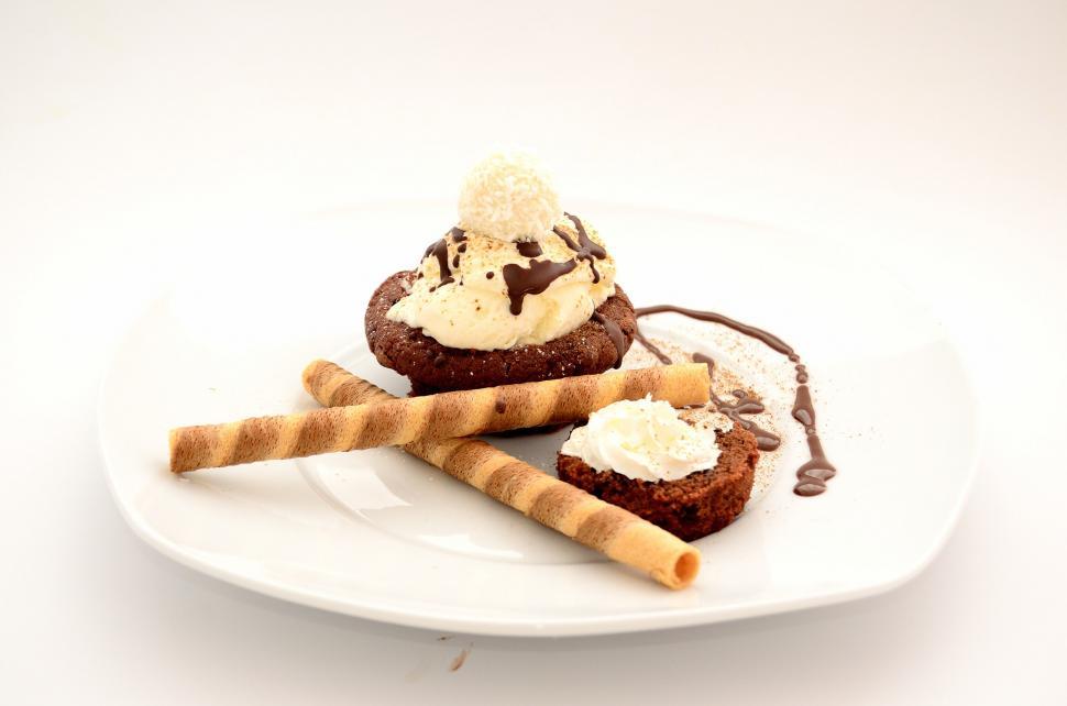 Free Image of White Plate With Two Desserts on Table 