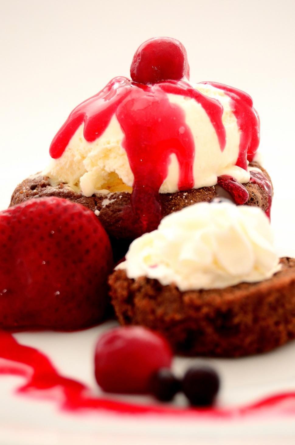 Free Image of White Plate With Chocolate Cakes and Whipped Cream 