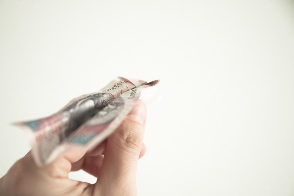 Free Image of Person Holding Bundle of Money 