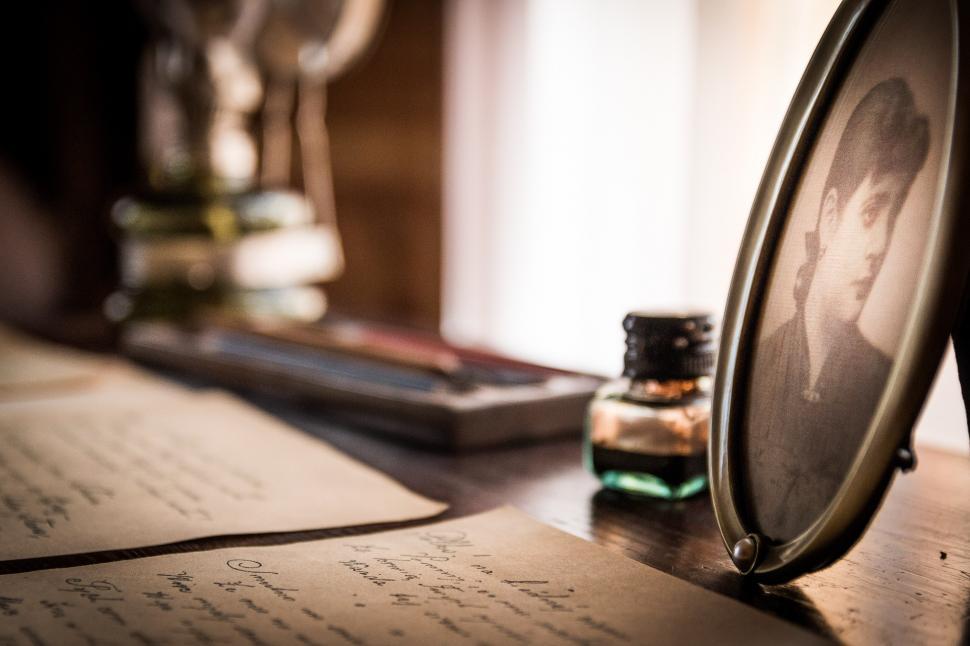 Free Image of Close Up of Desk With Magnifying Glass 