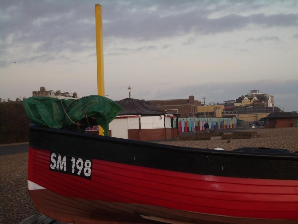 Free Image of Boat and Beach Huts 