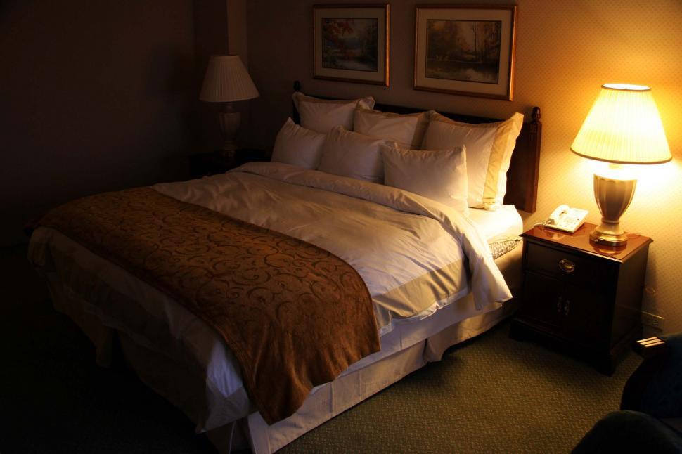 Free Stock Photo of hotel motel room king bed bedding sheets blankets