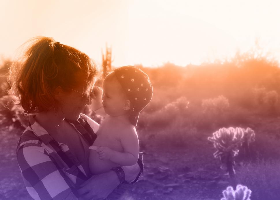 Free Image of Loving Mother Smiling to Her Baby Girl 