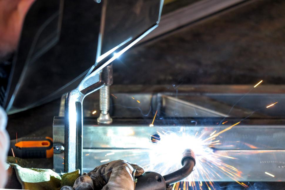 Free Image of Spaks fly from metal weld 