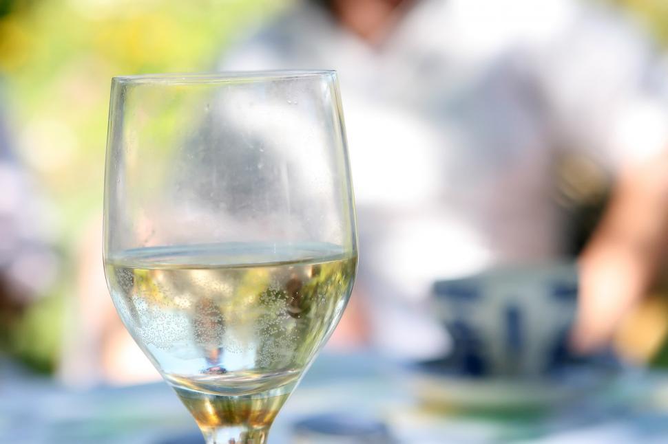 Free Image of Glass of White Wine on Table 