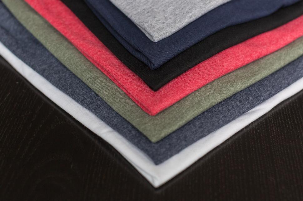 Free Image of Stack Of T Shirts 