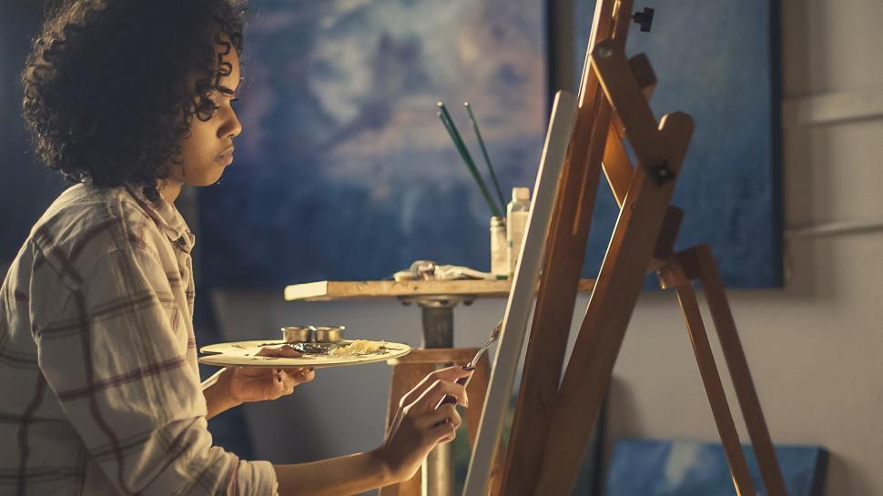 Free Image of Artist Painting In Studio 
