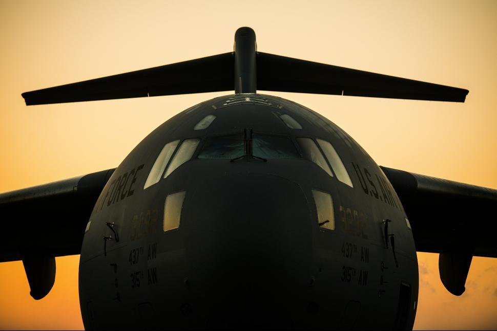 Free Image of Large Jetliner Parked on Airport Tarmac 