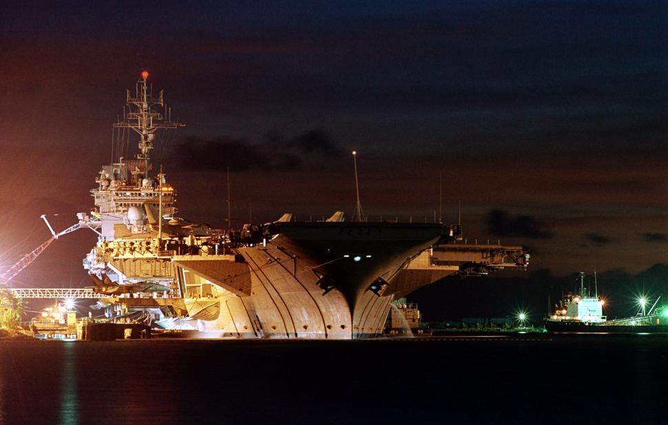 Free Image of Large Ship Sailing on Water at Night 