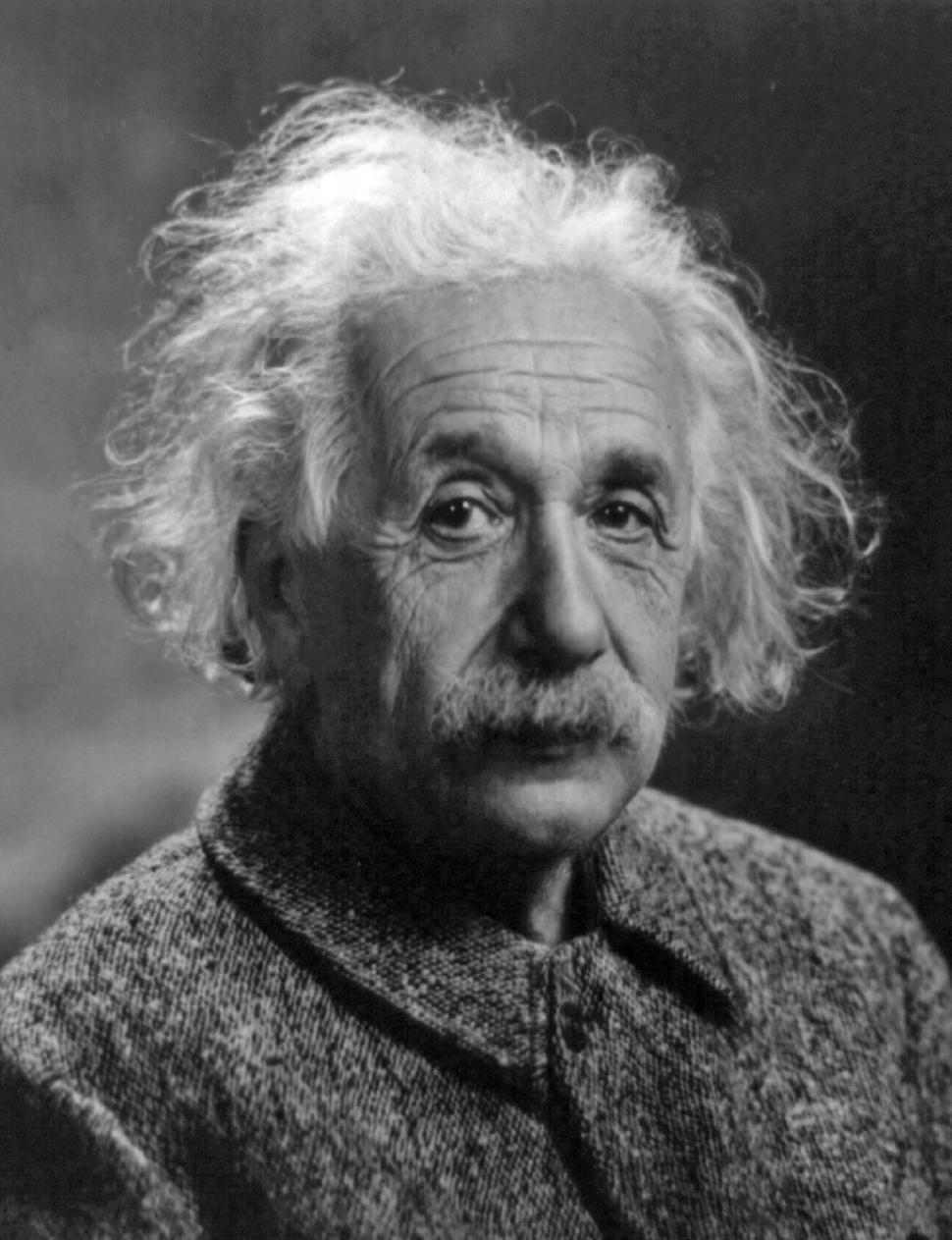 Free Image of Curly-Haired Man in Black and White 