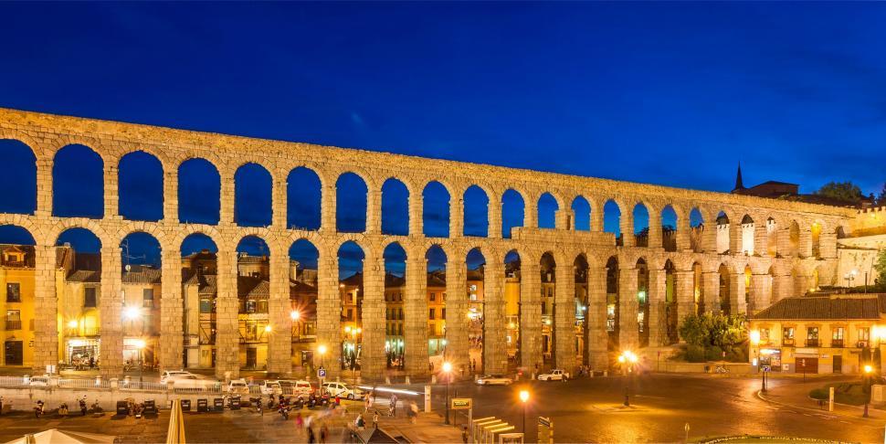 Free Image of Illuminated Stone Building With Arches at Night 