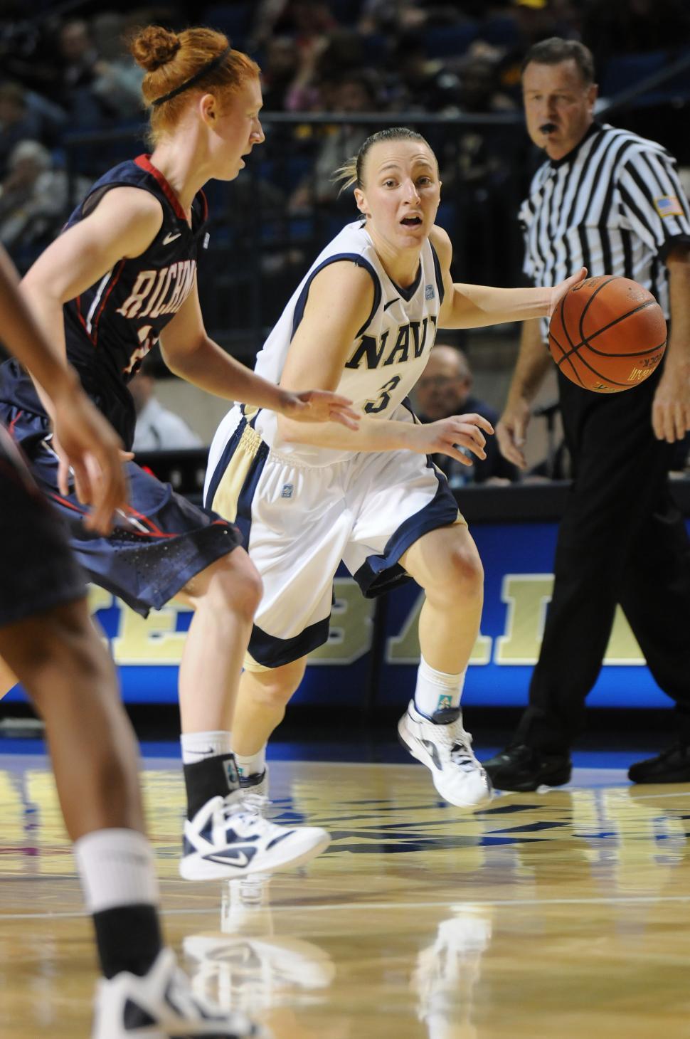 Free Image of Intense Womens Basketball Game With Ball in Air 