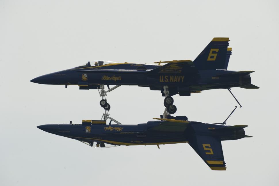 Free Image of Fighter Jets Flying Through Cloudy Sky 