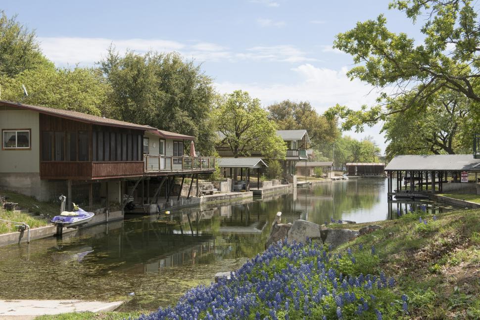 Free Image of House on River With Boat 
