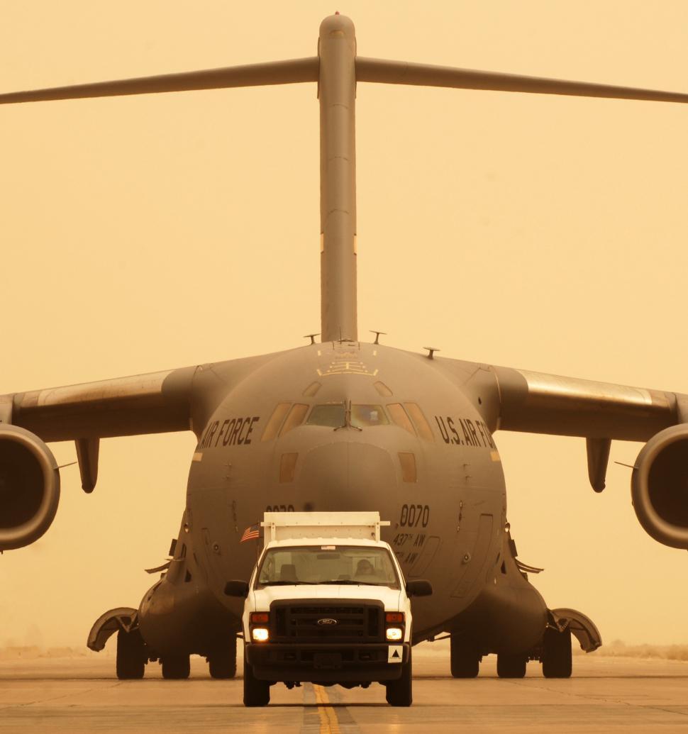 Free Image of Large Airplane on Top of Airport Runway 