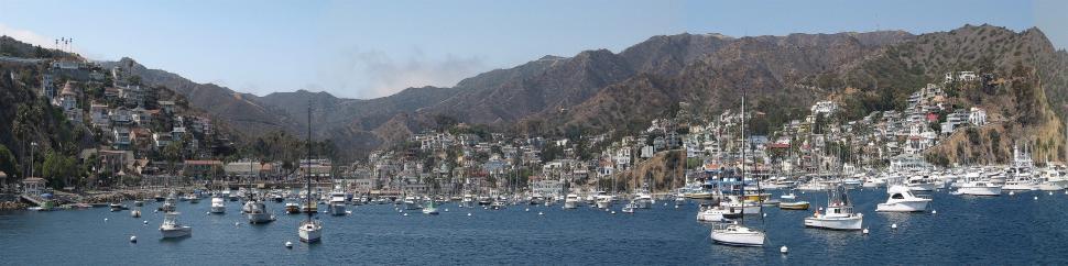 Free Image of Group of Boats Floating on a Body of Water 