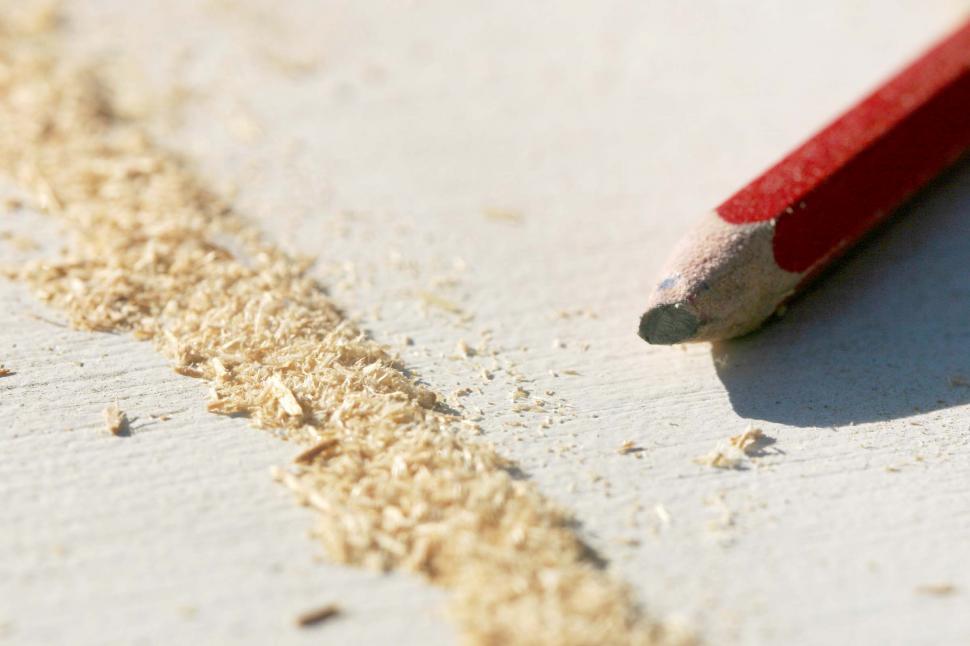 Free Image of Line of sawdust and pencil 