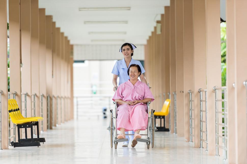 Travel Nurse Assisting Patient