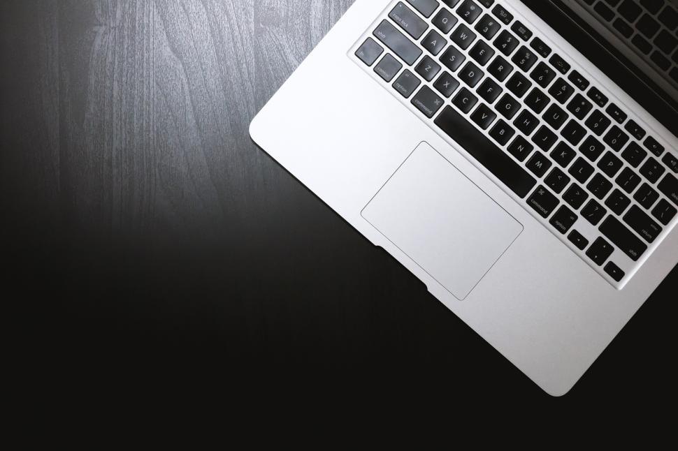Free Image of Laptop Computer on Wooden Desk 