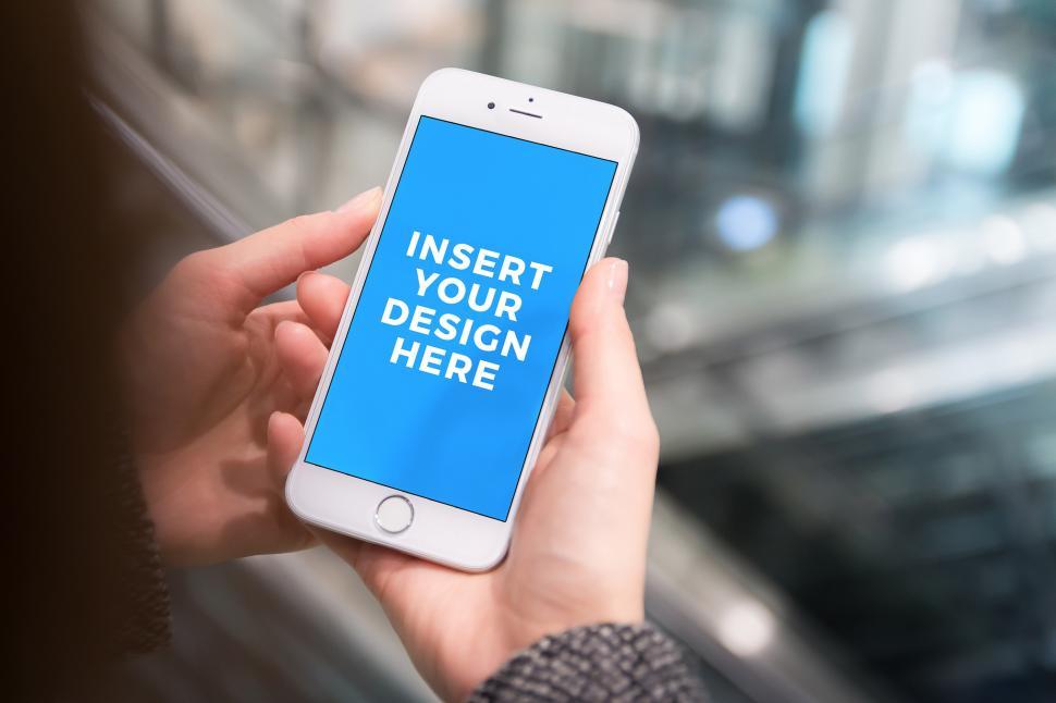 Free Image of Person Holding Cell Phone With Blue Screen 