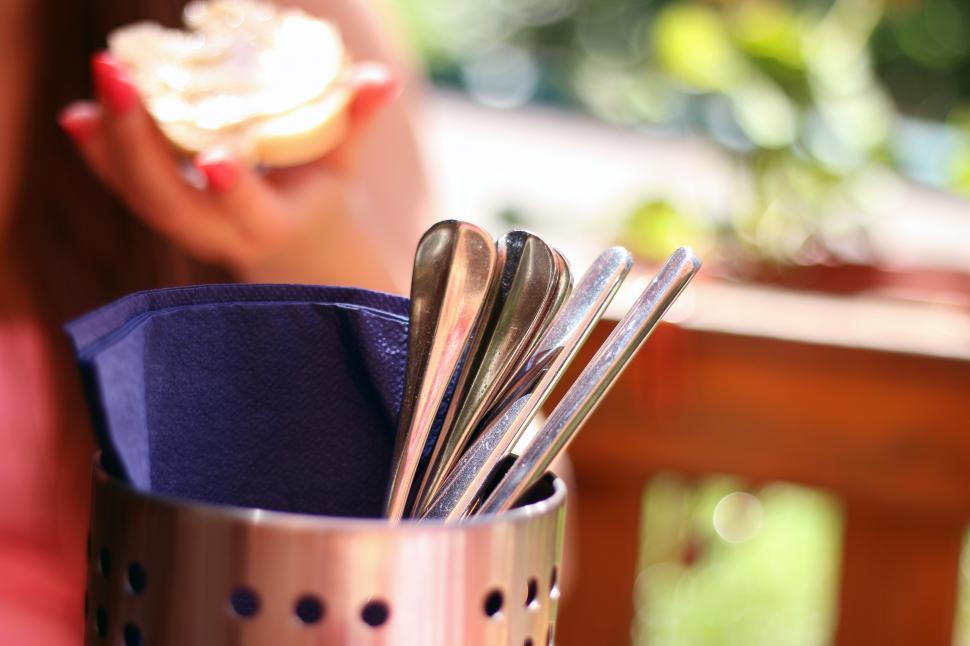 Free Image of Metal Cup With Spoons on Table 