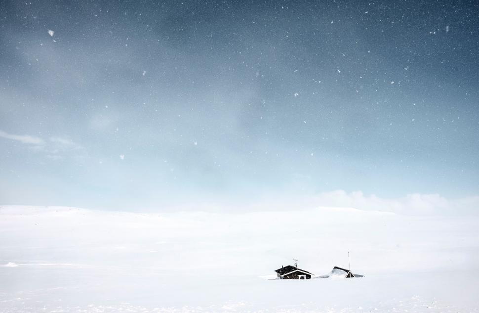Free Image of House in the Middle of a Snowy Field 