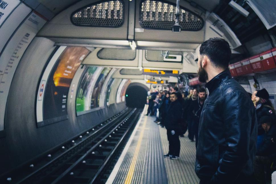 Free Image of Group of People Standing on Subway Platform 