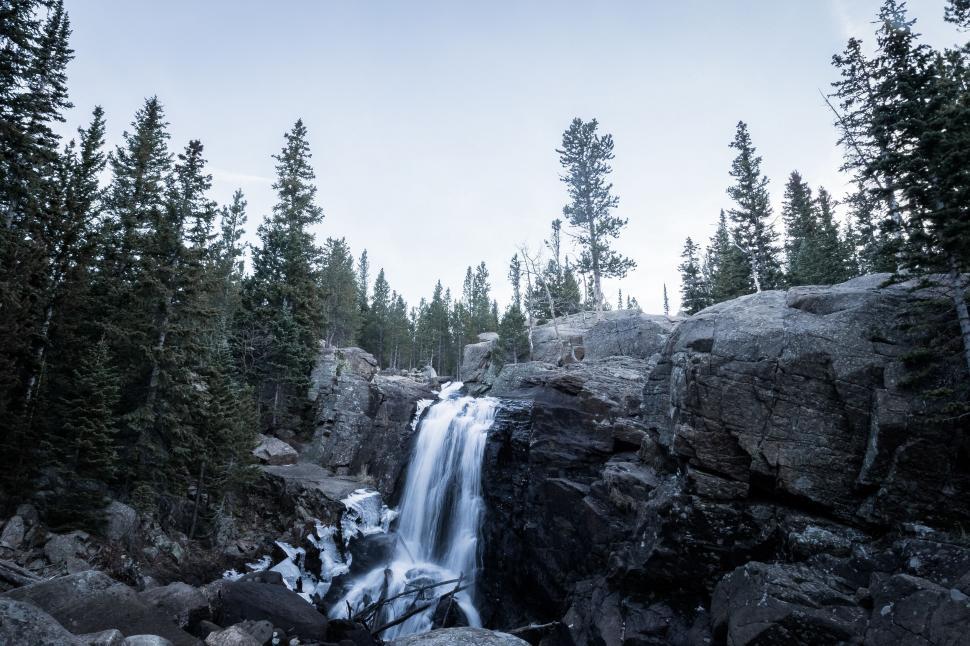 Free Image of Majestic Waterfall Flowing in Black and White 