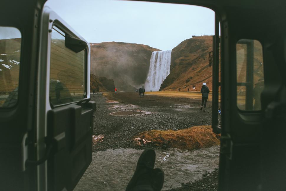 Free Image of Waterfall View From Inside Vehicle 