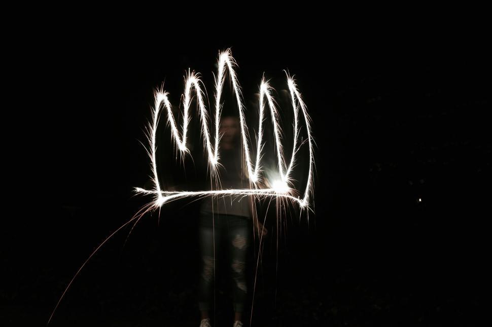 Free Image of Person Standing in the Dark 